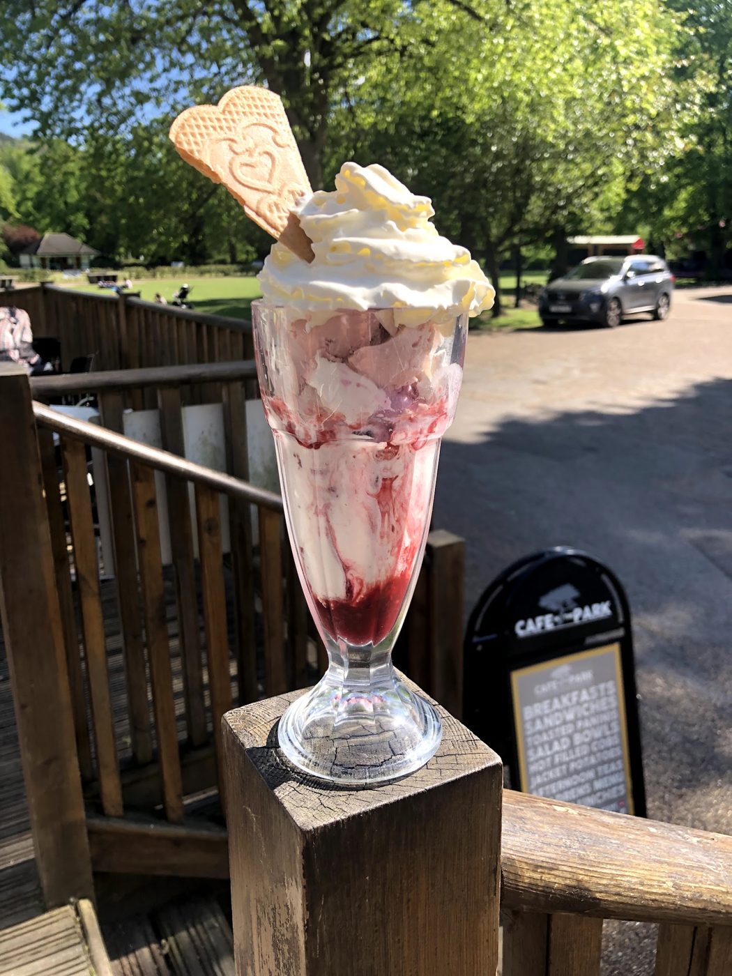 An ice cream sundae on the deck rail